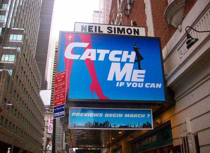Neil Simon Theatre on Broadway with billboard of musical ‘Catch Me If You Can’