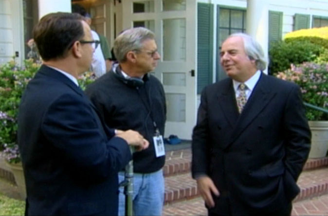 Actor Tom Hanks, F.B.I. Technical Advisor William Rehder and Frank Abagnale on the movie set