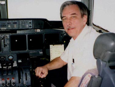 Pilot Paul J. Holsen II in the airplane cabin
